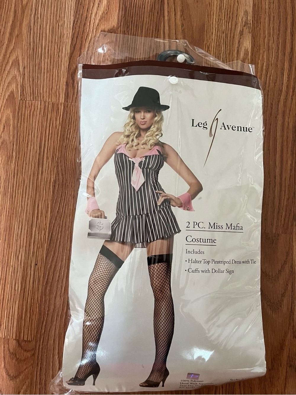 Ladies Halloween costume. Leg Avenue Black Pinstriped Halter Dress with Pink Tie